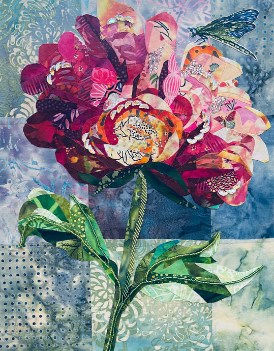 Colorful floral artwork made with layered fabric and mixed media, featuring  a luminous bloom in soft pinks and neutral tones with a dragonfly on a textured background 