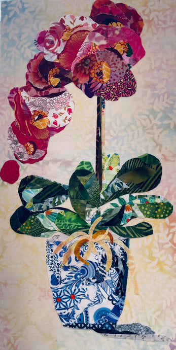 Floral artwork made with layered fabric and mixed media of pink orchid flowers in a blue and white Chinoiserie style vase on a textured background