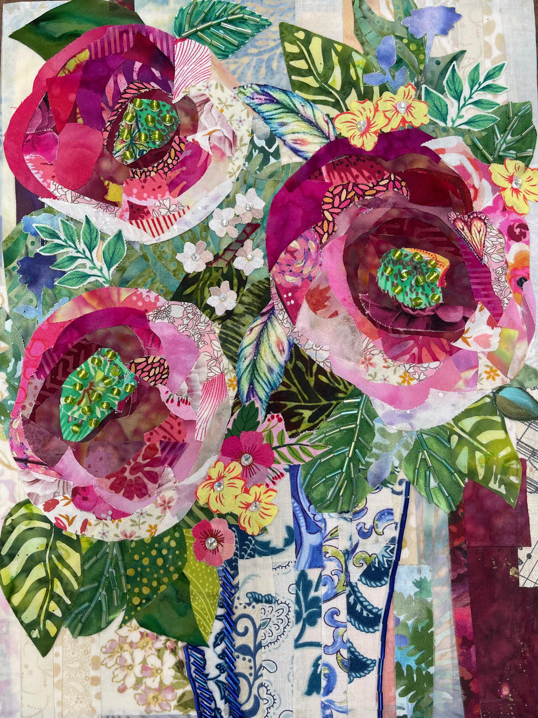 Flower vase  artwork made with layered fabric and mixed media, featuring abundant peony blooms in pink, blush, and green tones with richly textured blue and white vase