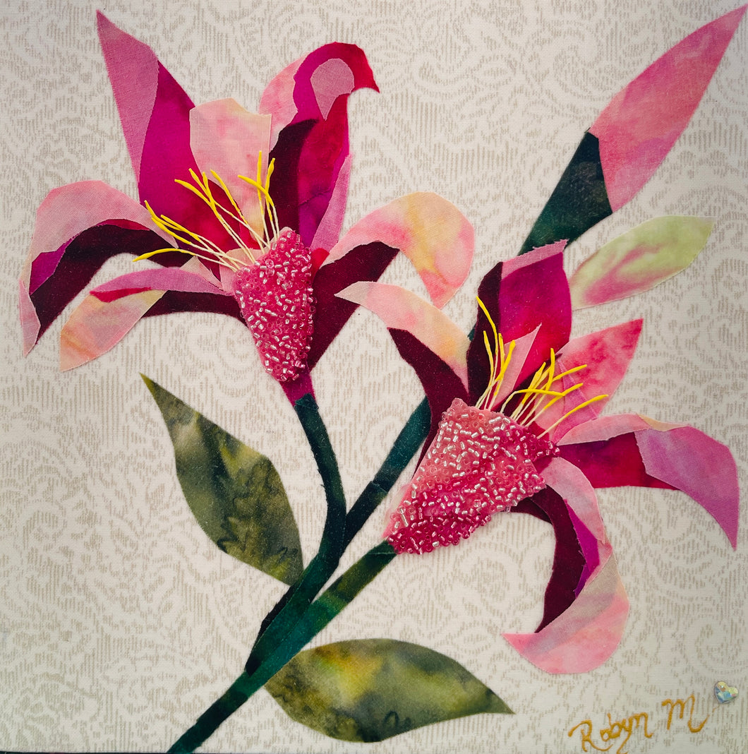 Fabric flower artwork with two soft pink and burgundy blossoms on 8x8 panel with layered textiles, Czech beads and green stems