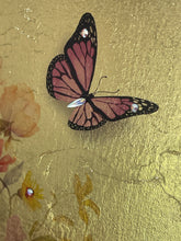 Close detail of Swarovski crystal flower centers and a Monarch butterfly on Full Bloom by Robyn Moore Arts, watercolor image transfer roses on gold leaf