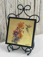 Original hummingbird mixed media artwork 8x8 inches, fine line hummingbird in watercolor wash over rust, gold, and plum blossoms with Swarovski crystal centers, gold leaf ground, birch panel, Golden Hour Collection, Robyn Moore Arts