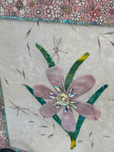 Close detail of the Swarovski crystals scattered across the floral fabric border and center on Where Light Softens by Robyn Moore Arts