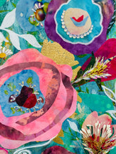 Close detail of Czech glass bead and Swarovski crystal flower centers on original mixed media botanical painting Where the Garden Sings by Robyn Moore Arts, showing navy bead starburst and coral bead radiant detail against orange and peach fabric blooms