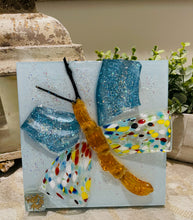 Colorful butterfly resin artwork with glass body and wings featuring multicolored patterns and shimmering texture
