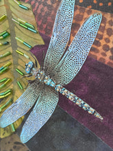 Close detail of crystal and paper dragonfly embellishment on original fabric botanical artwork Midnight Unfolding by Robyn Moore Arts, showing dense bead work catching light against deep violet batik fabric