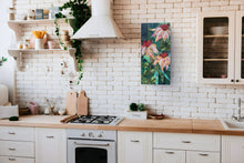 Original vertical fabric botanical artwork Where They Glow by Robyn Moore Arts displayed in a  kitchen on a white brick wall in a cool modern inspired interior