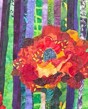 Close detail of layered batik fabric poppy petals on original fabric floral artwork Where They Open by Robyn Moore Arts, showing richly patterned crimson orange and gold fabric layers building dimensional poppy bloom form