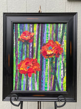 Original all fabric floral collage artwork 20x16 inches, three bold poppy blooms in crimson burnt orange and golden yellow batik fabric against vertical striped batik background in purple lavender green and yellow, presented in deep black frame, shown on easel, part of the Floral and Botanical Collection by Robyn Moore Arts