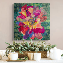 Original fabric botanical artwork Wild Bloom by Robyn Moore Arts displayed above a styled console table with decorative objects and plant in a cool transitional interior
