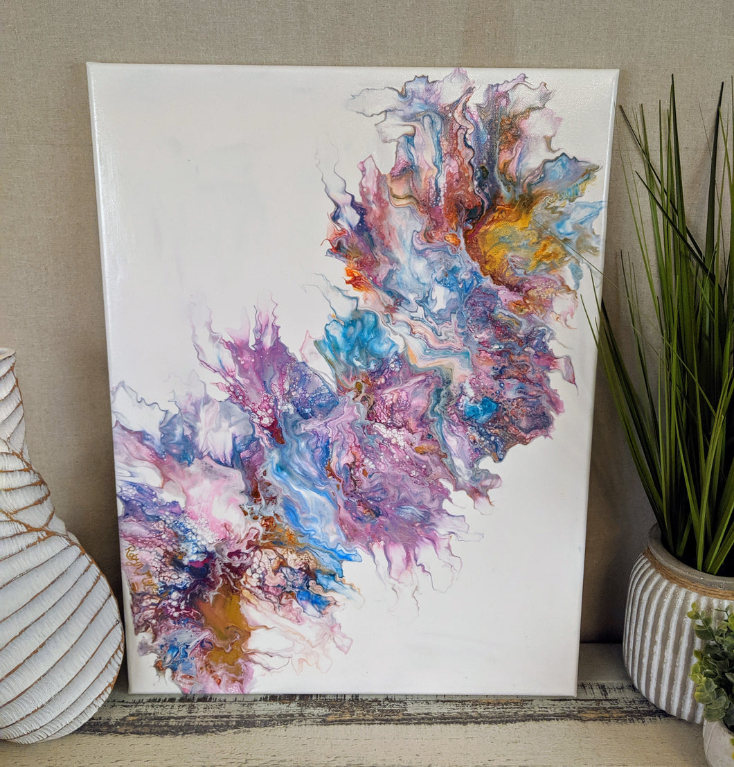 abstract fluid acrylic painting in a rainbow of colors