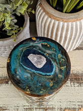teal and brown canister with teal resin art lid and agate crystal