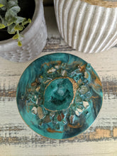 white and green floral candle with green teal gold agate lid