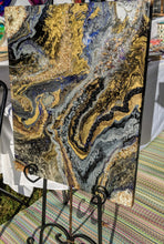 abstract resin art in black brown bronze and white to look like a agate outside