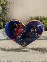 abstract fluid resin heart in purple pink dark teal and gold with crystals