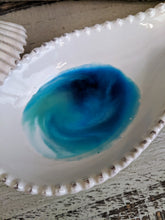 white ceramic spoon rest with ocean inspired resin