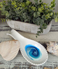 white ceramic spoon rest with ocean inspired resin