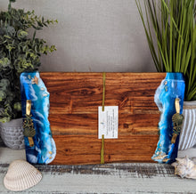 wood cheese board with ocean scene and handles