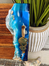 wood cheese board with ocean scene and handles