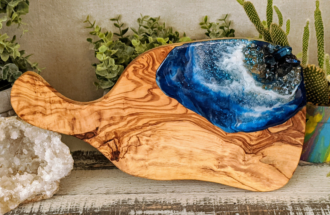 olive wood cheese board with blue and white resin and crystals