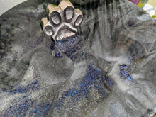 close up chrome dog food canister with grey black and blue glitter resin