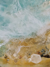 close up abstract shell ocean resin tray with shells