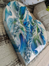 abstract blue green white resin heart with fire glass