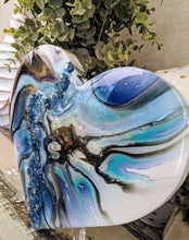 abstract fluid heart blue black resin and fire glass