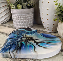 abstract fluid heart blue black resin and fire glass