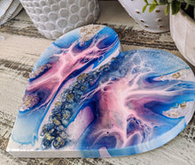 abstract blue pink resin heart with fire glass