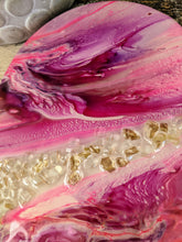 close up abstract resin heart pink lavender fire glass