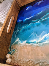 close up ocean looking wood tray resin blue teal white shells