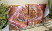 vibrant abstract resin art in orange white purple with crystals