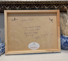 back side of art with title, quote and signature