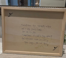 back side of artwork showing title, signature and quote