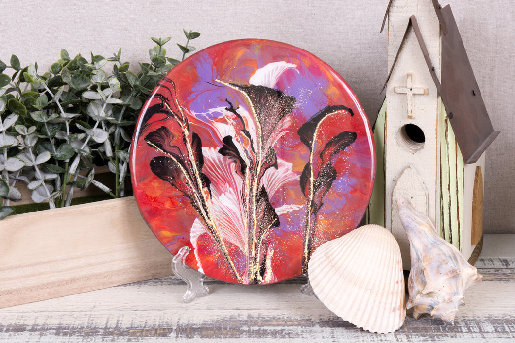 abstract round fluid painting red with black purple white lilys