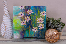 abstract fluid acrylic white daisy painting with texture and vibrant blue colors