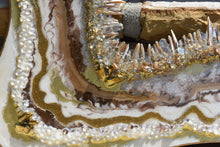 close up gold and white resin geode inspired painting