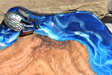 blue ocean cheese board with shells close up