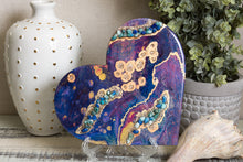 Abstract blue purple magenta heart with blue stones