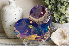 abstract blue purple heart with stones
