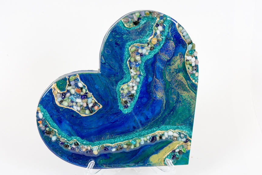 abstract blue green heart with stones