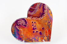 abstract orange purple heart with stones