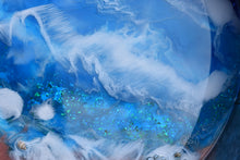 round metal blue ocean tray close up