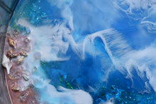 round metal blue ocean tray close up