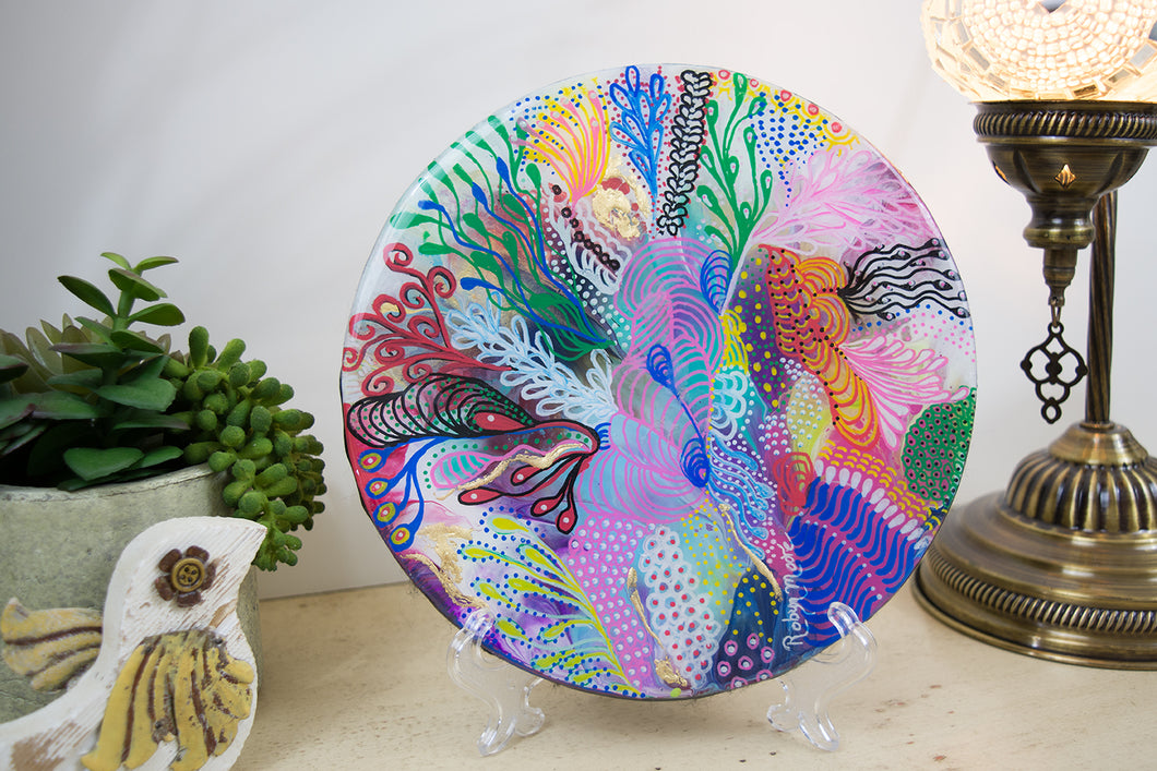 abstract rainbow colors of acrylic paint underwater coral round wood