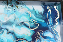 wood serving tray with blue teal white and gold with stones close up