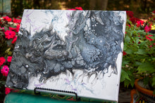 abstract fluid acrylic painting with texture and black and silver colors
