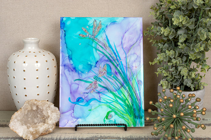 abstract alcohol ink dragonflies on pond wispy grass